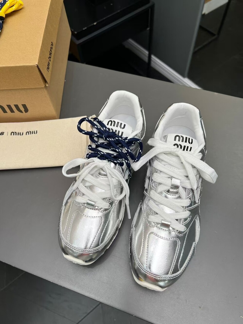 Miu Miu x New Balance Silver Co-Branded Sneakers